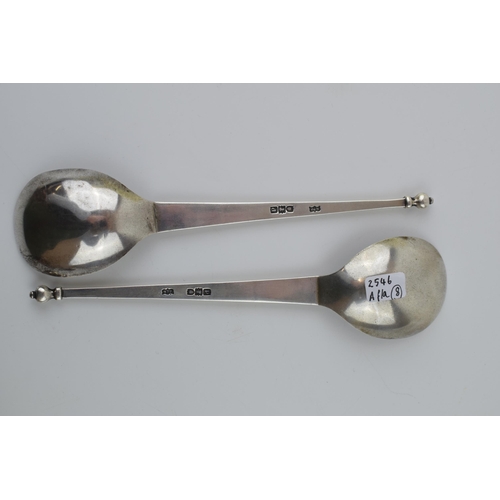 200 - Arts and Crafts style silver spoons, a pair, Hallmarked London 1899 'M & W'. 20cm. Weight 95.9 grams... 