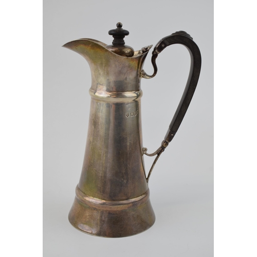 217 - Hallmarked silver Art Nouveau hot water jug, 292.6 grams, with ebonised handle and finial, London 19... 