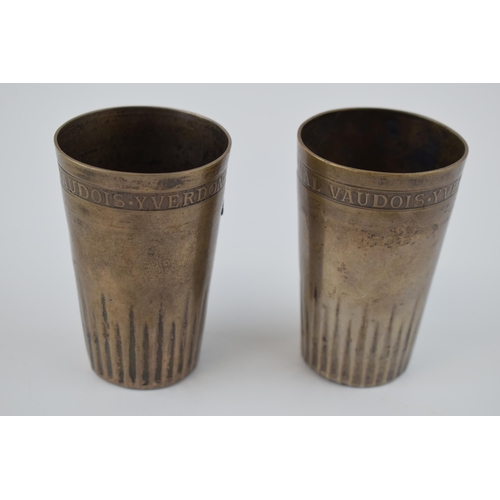 220 - A pair of .800 silver Victorian silver beakers 'Libertie Et Patrie', 8cm tall, 114.3 grams (2).