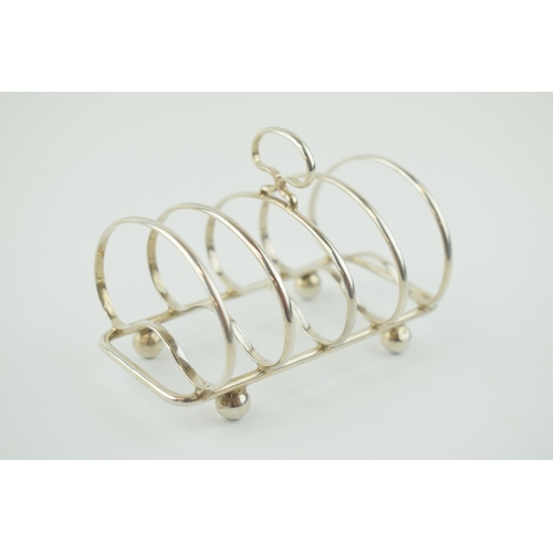 233 - Silver 5 bar toast rack, Birm 1945, H Mitchell, 65.0 grams.