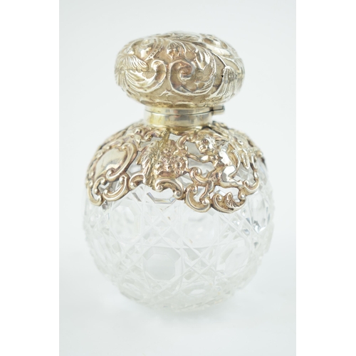 244 - Silver mounted globular perfume bottle, Chester 1900, 10.5cm tall, with glass stopper.