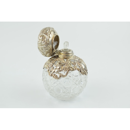 244 - Silver mounted globular perfume bottle, Chester 1900, 10.5cm tall, with glass stopper.