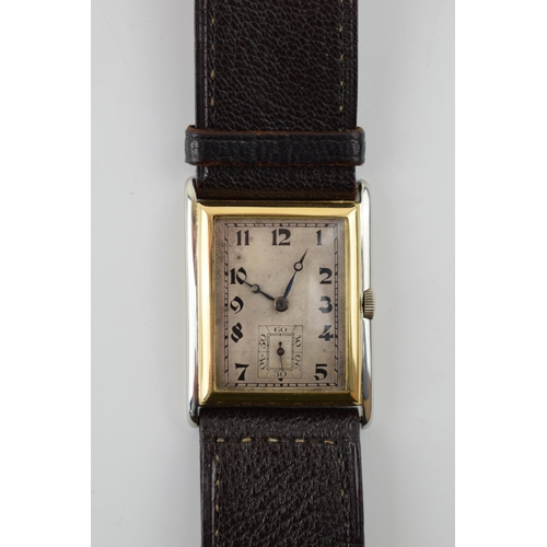 336 - 18ct gold and white gold cased vintage manual rectangular wristwatch, on leather strap, circa 1928, ... 