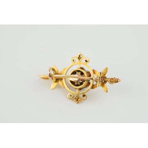 389 - 14k gold floral brooch, set with central diamond, circa 0.45/0.5ct, with black enamel, 3.8 grams, 35... 