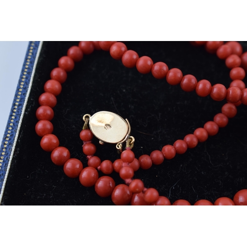 392 - A quality set of untreated Sardinian coral graduated beads, presented as a necklace on an 18ct gold ... 