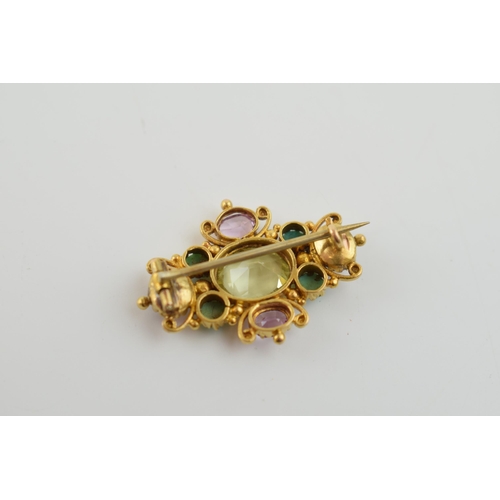 393 - Tests as 9ct gold (or better) lady's brooch, set citrine, turqouise and amethyst stones, 3.6 grams, ... 