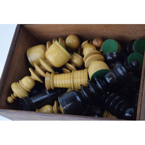 63 - 19th century chessmen, boxwood set ' A Set of Chessmen'. King height 11cm in original box.