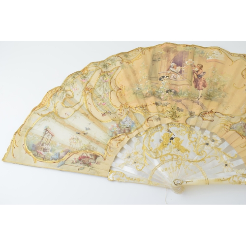 78 - Edwardian silk decorated fan with highly worked and gilded mother of pearl front & rear, and in orig... 