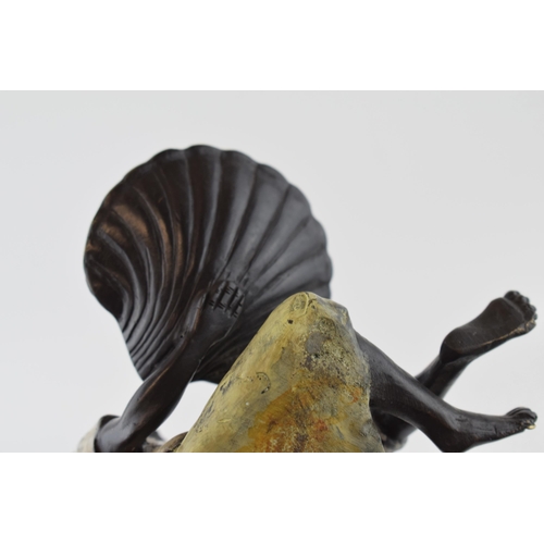 85 - Cold painted bronze figure of a seated gentleman holding a mussels dish, 18cm wide.