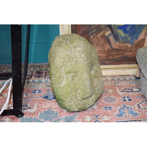 87 - Antique carved stone head weathered with distinctive nose, freestanding, 26cm tall.