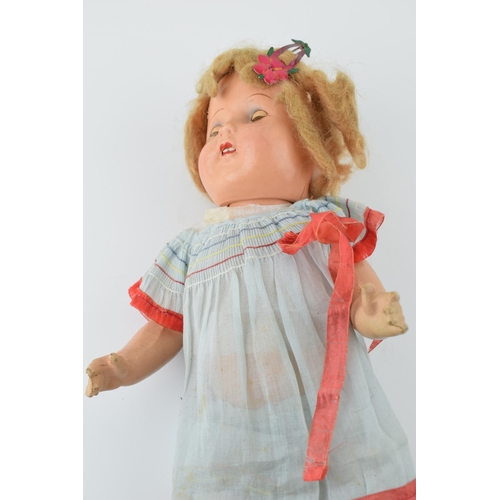 149 - Shirley Temple Doll c1910, composite head and limbs,