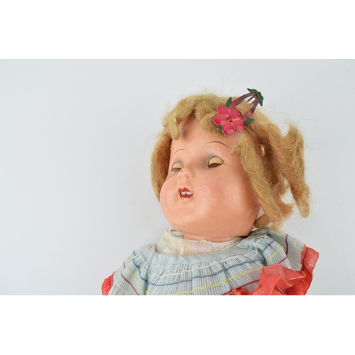 149 - Shirley Temple Doll c1910, composite head and limbs,