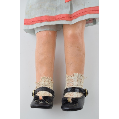 149 - Shirley Temple Doll c1910, composite head and limbs,