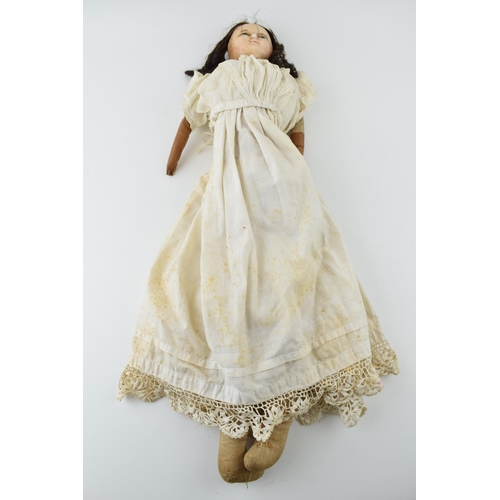 151 - Wax head antique doll in white dress with leather arms. Height 59cm. c1840.