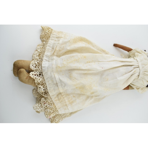 151 - Wax head antique doll in white dress with leather arms. Height 59cm. c1840.