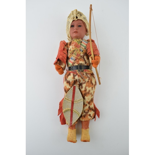 153 - Antique AM male doll, Made in Germany 14/0. Dressed in hunting attire with bow and shelf. Height 32c... 