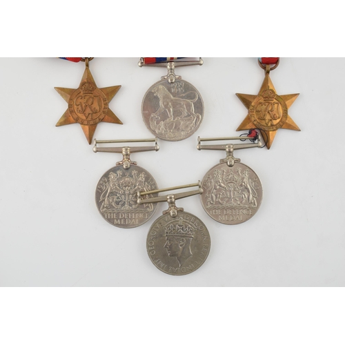 160 - Two groups of WWII medals to include The Defence Medal (2) one with original ribbon, 1939 - 1945 med... 