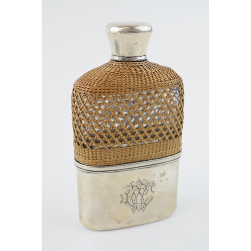 205 - Victorian silver and glass hipflask, with raten effect grip with removable silver cup, cork stopper ... 