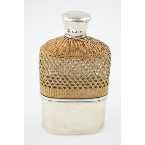 205 - Victorian silver and glass hipflask, with raten effect grip with removable silver cup, cork stopper ... 