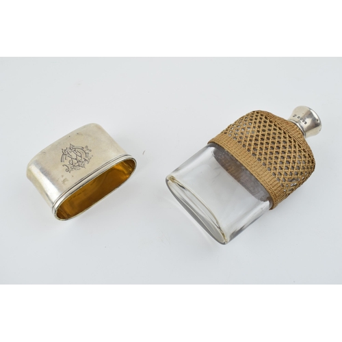 205 - Victorian silver and glass hipflask, with raten effect grip with removable silver cup, cork stopper ... 