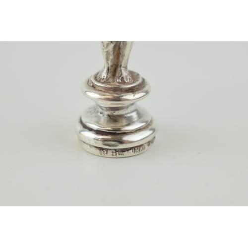 213 - A late 19th century silver figural desk seal, import marks for Berthold Muller, 9cm tall.