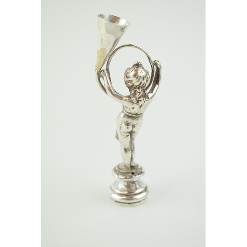 213 - A late 19th century silver figural desk seal, import marks for Berthold Muller, 9cm tall.