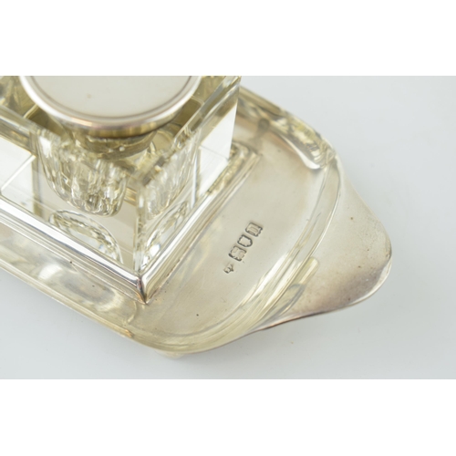 235 - Hallmarked silver inkwell set to include silver stand with 2 glass silver topped inkwells, tray 143.... 