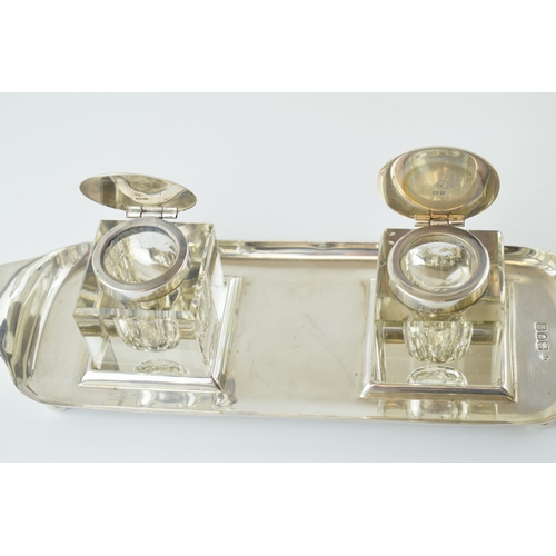 235 - Hallmarked silver inkwell set to include silver stand with 2 glass silver topped inkwells, tray 143.... 