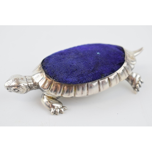 239 - Hallmarked silver pin cushion in the form of a tortoise, Birmingham 1906, makers CS FS, 8cm long.