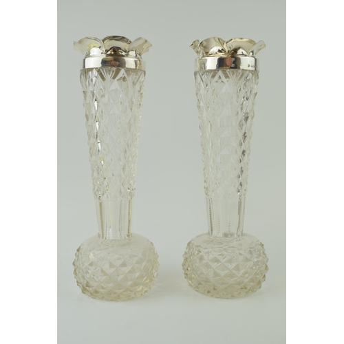 240 - A large pair of cut glass vases with silver rims, Birm 1899, William Hutton and Sons, 25cm tall (2).