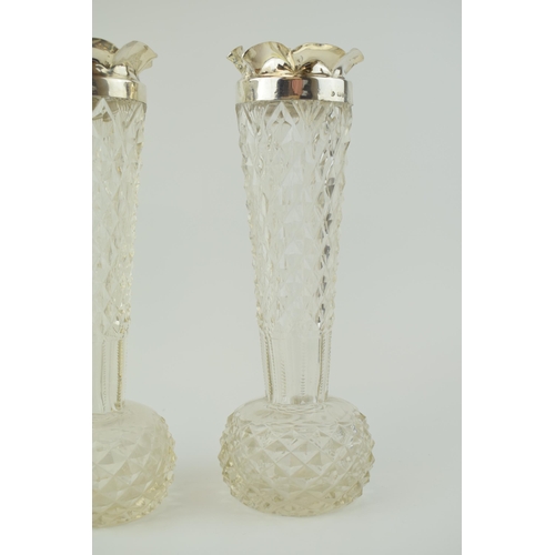 240 - A large pair of cut glass vases with silver rims, Birm 1899, William Hutton and Sons, 25cm tall (2).