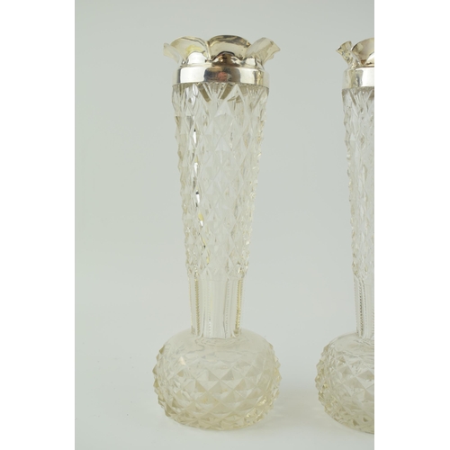 240 - A large pair of cut glass vases with silver rims, Birm 1899, William Hutton and Sons, 25cm tall (2).