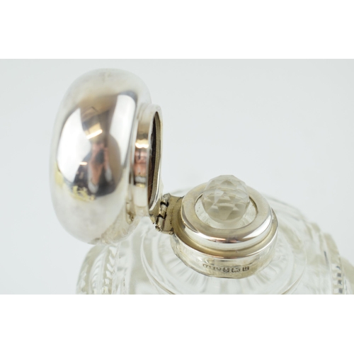 245 - Silver topped cut glass perfume bottle, with glass stopper, Birm 1919, H and H Ltd, 11cm tall.