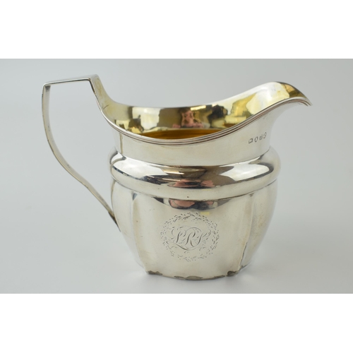 252 - Georgian silver jug with gilt wash interior, engraving to side, George III, London 1803, 140.0 grams... 