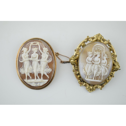 268 - A pair of vintage cameo brooches, both depicting the three graces, metal frames (2), 6cm tall.