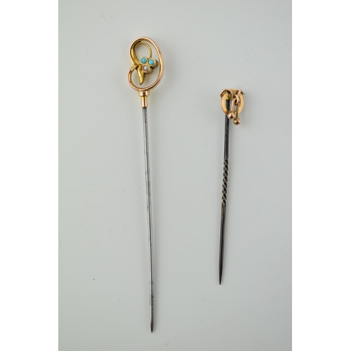 269 - A pair of 9ct gold headed stick pins, one set turquoise, both on metal pins, gross weight 2.8 grams,... 