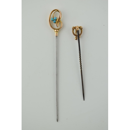 269 - A pair of 9ct gold headed stick pins, one set turquoise, both on metal pins, gross weight 2.8 grams,... 