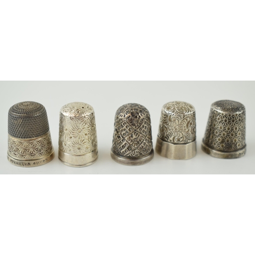 273 - A collection of five silver thimbles of varying styles, 21.4 grams (5).