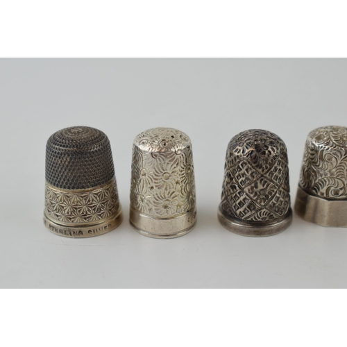 273 - A collection of five silver thimbles of varying styles, 21.4 grams (5).