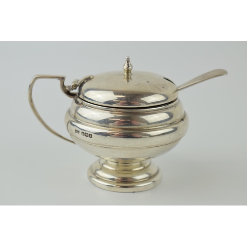 280 - Victorian silver mustard pot, Sheffield 1883, with a silver spoon (2), 74.8 grams of silver.