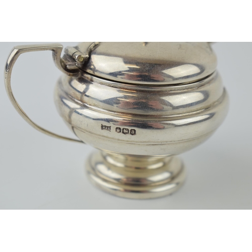 280 - Victorian silver mustard pot, Sheffield 1883, with a silver spoon (2), 74.8 grams of silver.