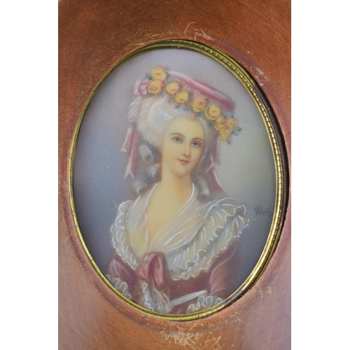 282 - A framed and signed miniature of a lady, maybe signed 'Watton', 16 x 14cm.