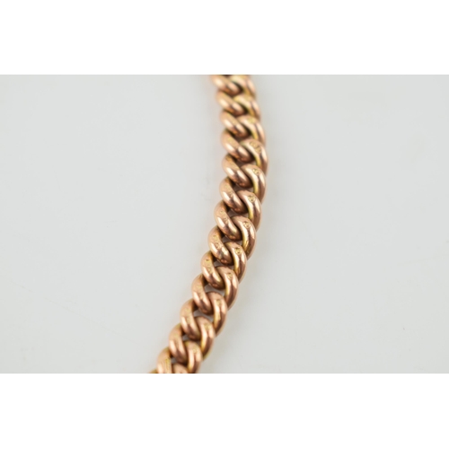 292 - 9ct rose gold double albert chain with hallmarked links, T-bar and fob, 38.2 grams, 38cm long.