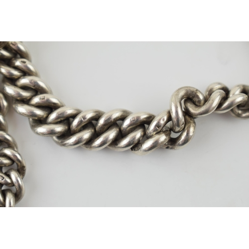 294 - A silver double Albert chain, hallmarked every link, with double lobster claw clasps, T bar and fob.... 