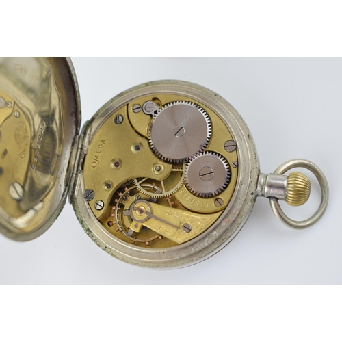 299 - A top winding Omega pocket watch with Arabic Numerals and subsidiary dial. Case diameter 38mm.