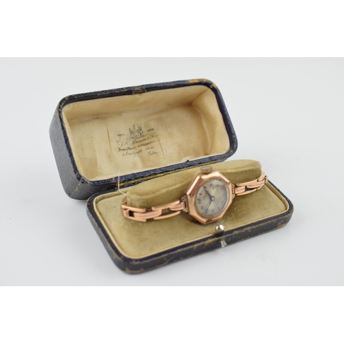 301 - 9ct gold ladies wristwatch on expanding 9ct gold strap, in period leather fitted box, watch and stra... 