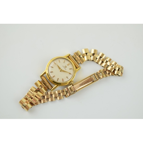 303 - Omega ladies manual wristwatch, 19mm, in gold plated case, on 9ct gold strap, gross weight 17.0 gram... 