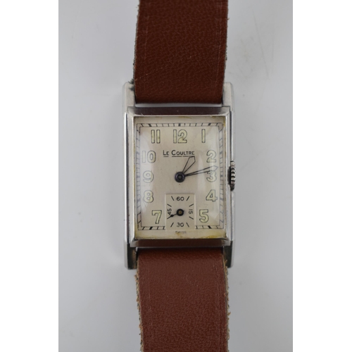 304 - Art Deco gentleman's Jaeger LeCoultre wristwatch. Rectangular off-white dial with luminous numbers a... 