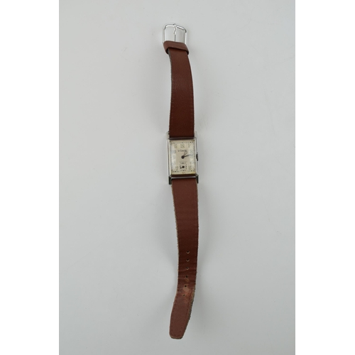 304 - Art Deco gentleman's Jaeger LeCoultre wristwatch. Rectangular off-white dial with luminous numbers a... 