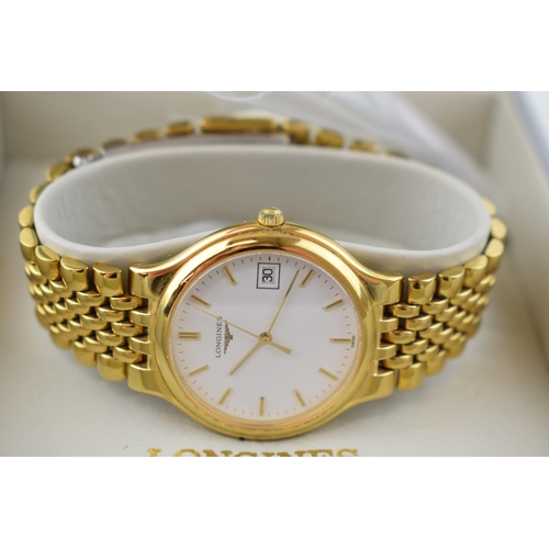 309 - A Longines gentleman's quartz date movement gold plated wristwatch. Model no. 26495828. Round white ... 